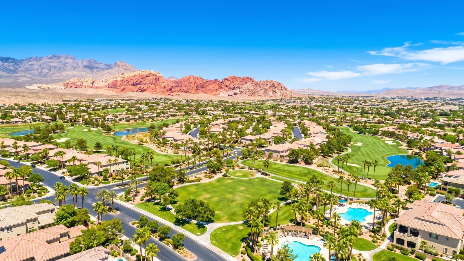 New construction homes in Summerlin, Las Vegas — Howard Hughes master plan villages against the Red Rock escarpment